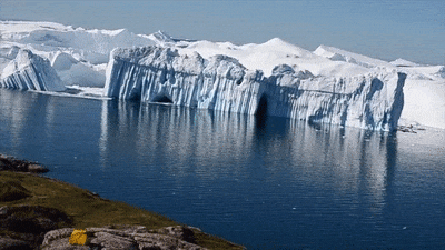 An iceberg flips on its side